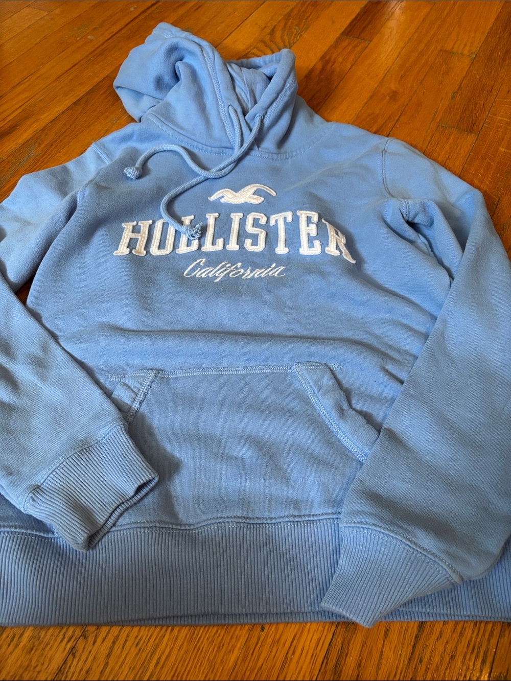 Hollister Light Blue Pullover Hoodie with Embroidered Logo